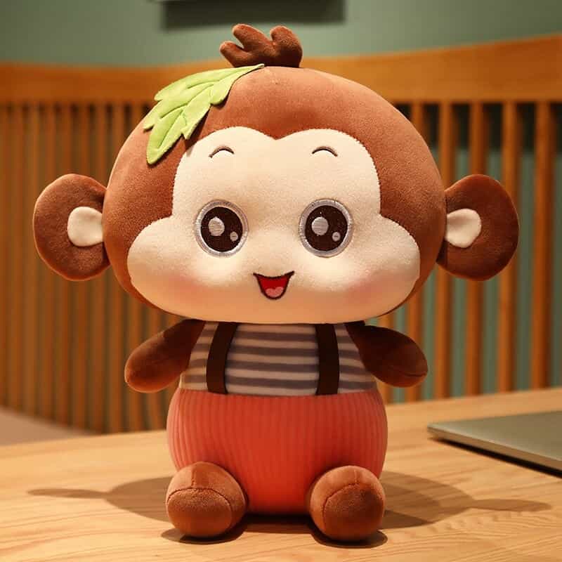 Jolie Peluche Singe Assis Salopette Rouge